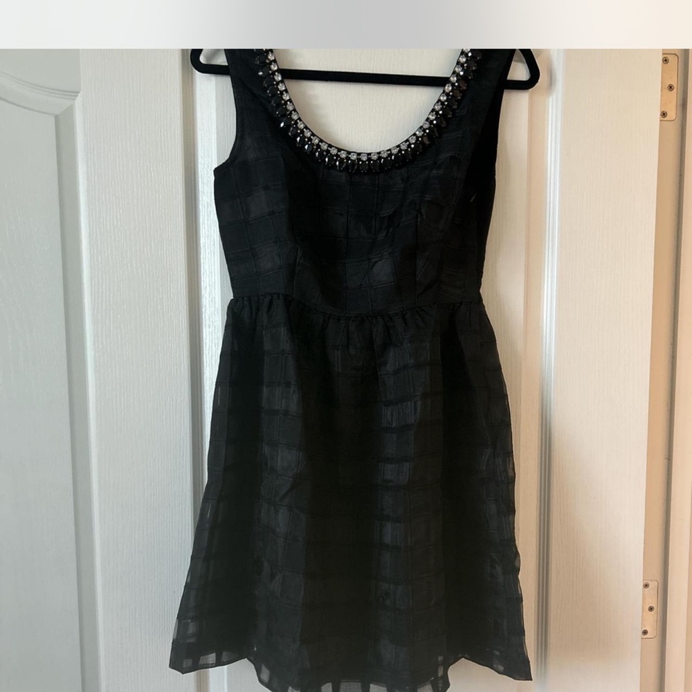 NWT black size medium jewel neck lined black Lucy Paris Dress